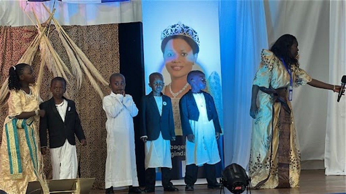 Young children showcasing their cultural attire.